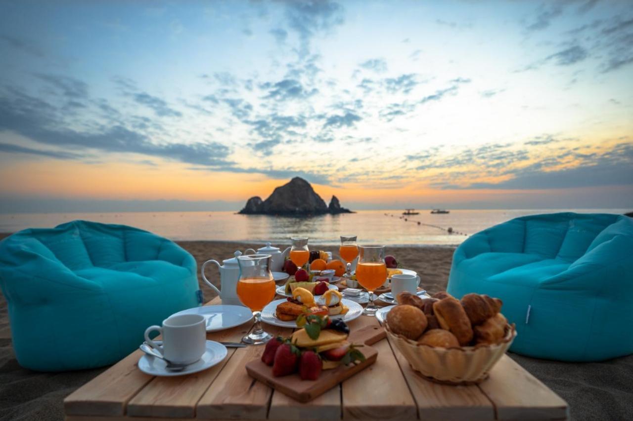 Sandy Beach Hotel & Resort Al Aqah Exterior foto