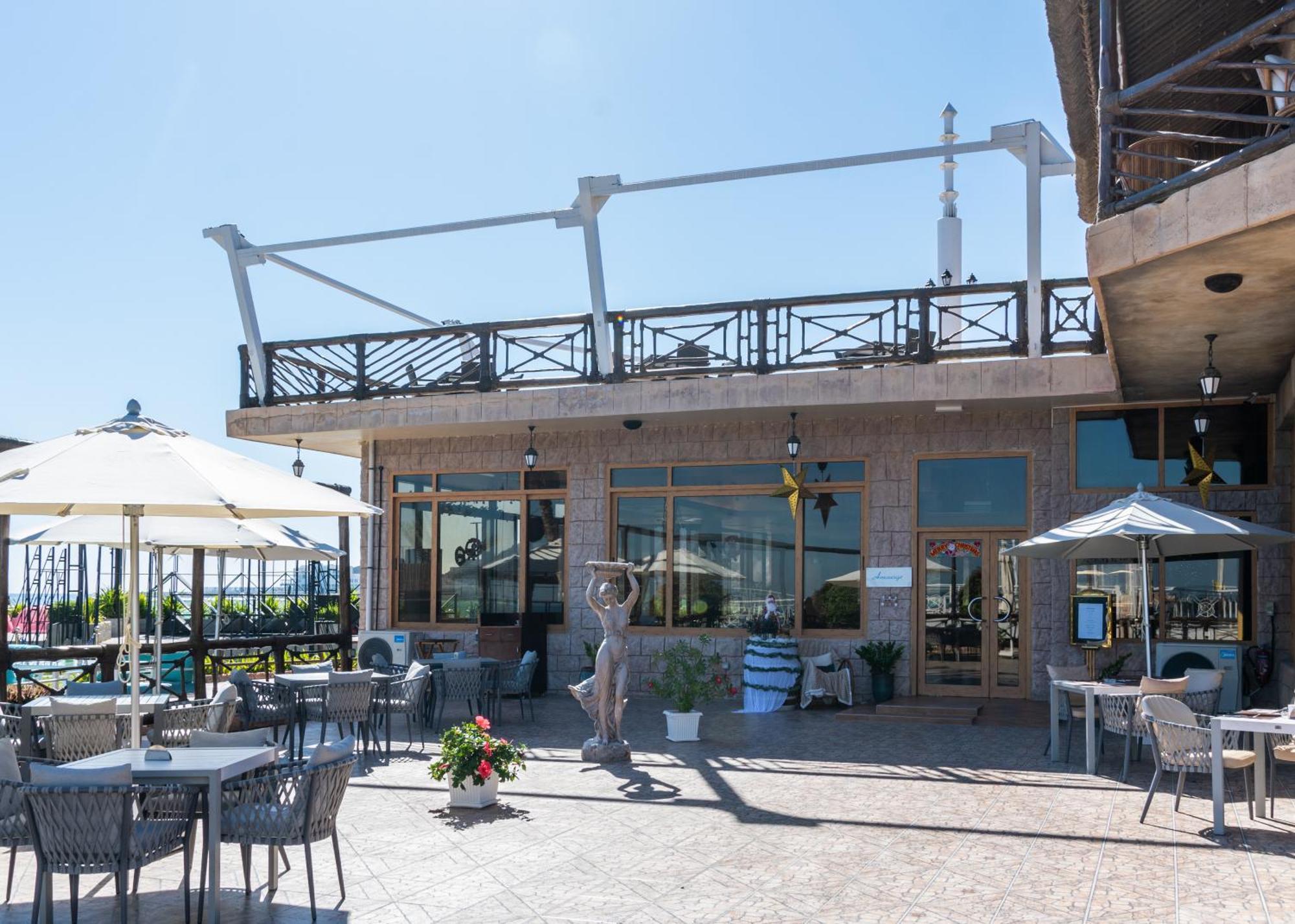 Sandy Beach Hotel & Resort Al Aqah Exterior foto